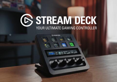 An Elgato Streamdeck on worktop a Computer setup is in the background along with a lamp and some red curtains, the text reads STREAM DECK | Your Ultimate Gaming Controller